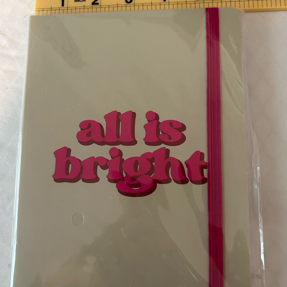 Cream Notebook with Pink Text and Band - Picture 2 of 5
